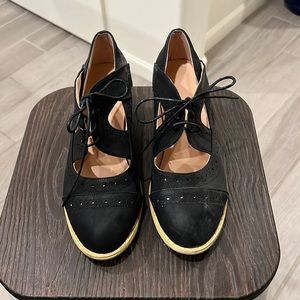Black suede shoes.
